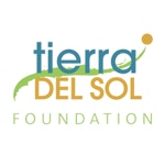 Tierra Del Sol Foundation logo with colorful text and a rising sun design.